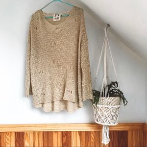 Distressed sweater